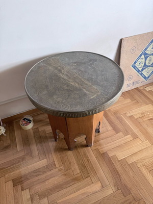 Vintage table used with carved metal tray and wooden base