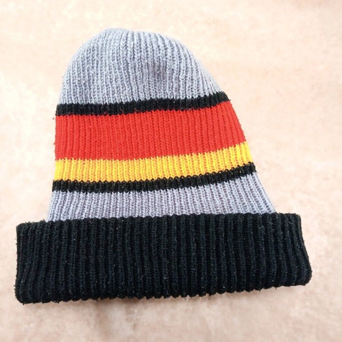 Warm multicolor acrylic hat used