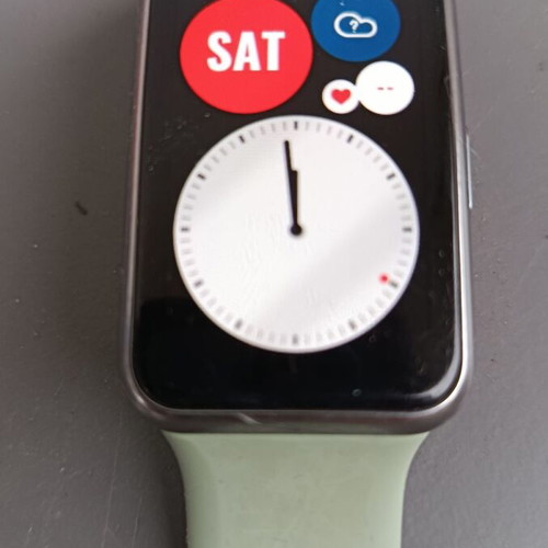 Huawei Watch Fit mint color with charger like new