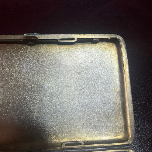 Silver cigarette case used with red stone and gold plating