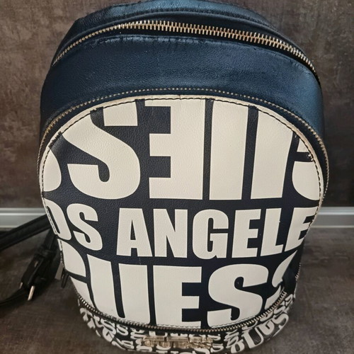 Guess backpack used with leather cracks