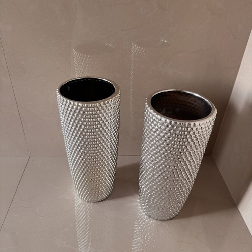Set of two modern silver embossed vases like new