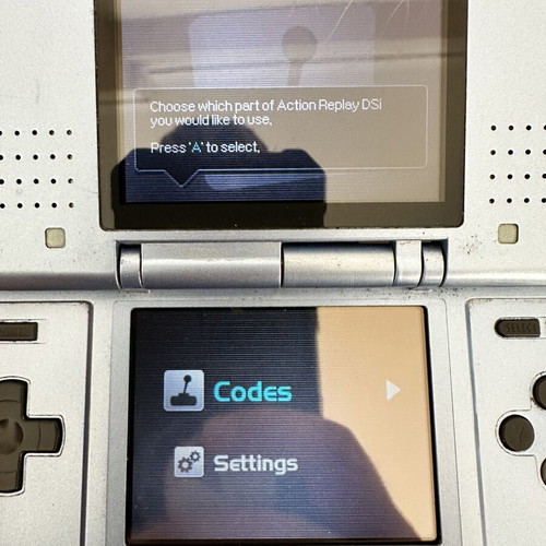 Action Replay DS used, fully functional with cable