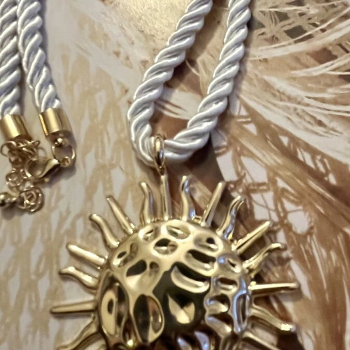 Necklace with Gold Sun Pendant and Cream Twisted Cord