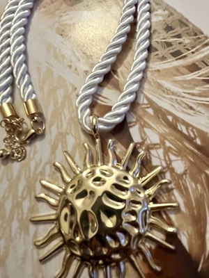 Necklace with Gold Sun Pendant and Cream Twisted Cord
