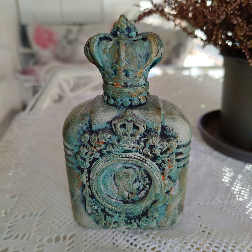 Handmade decorative bottle like new with mixed media and verdigris patina