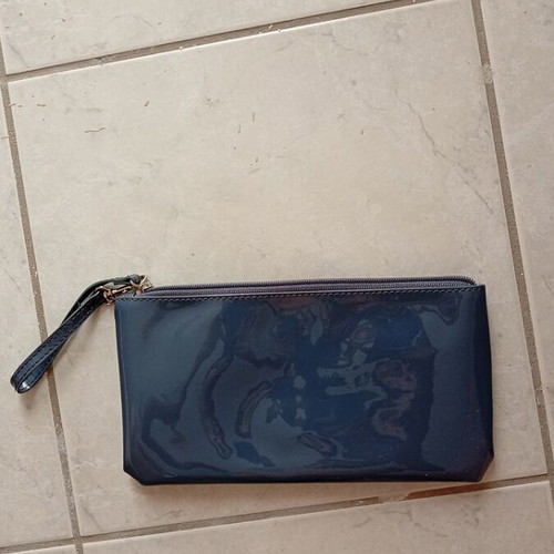 Kem bag wallet unused, shiny gray