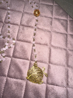 Necklace with pink stones and fish element like new