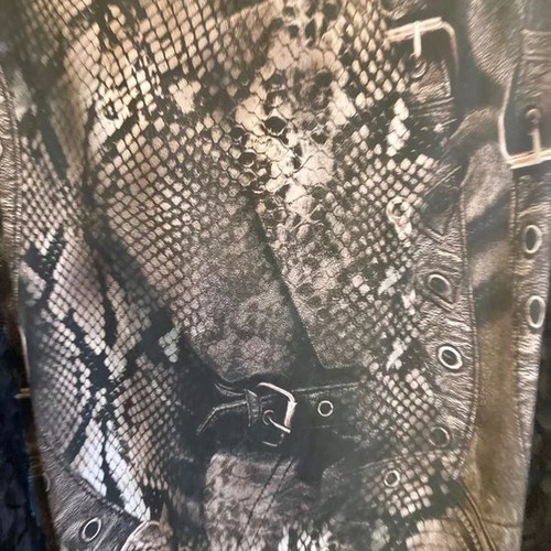 Animal print blouse used, jersey with laser-cut sleeve