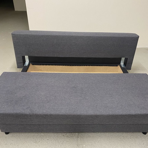 Three-seater sofa bed like new with storage space and 3 cushions