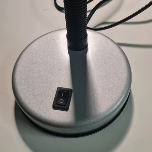 Desk lamp used with flexible arm and switch silver color