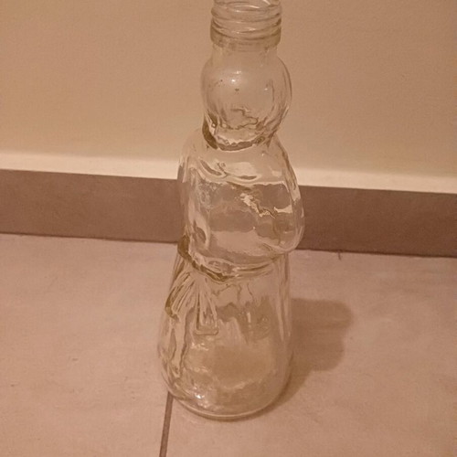 Bottle shaped like a woman, like new