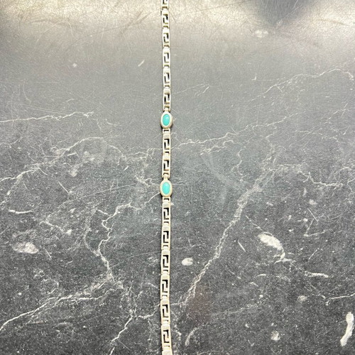 Silver bracelet like new with Greek key design and turquoise stones