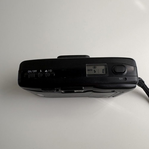 Nikon Lite Touch AF film camera like new with Kodak film and Panasonic battery