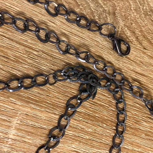 Metal adjustable black belt