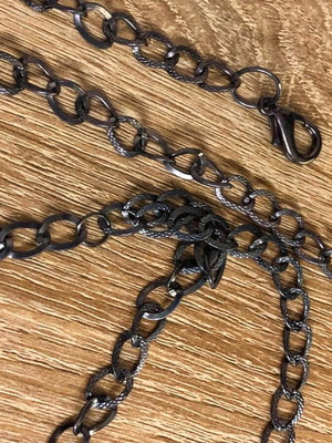 Metal adjustable black belt