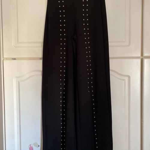 Bershka black pants with studs used, size small