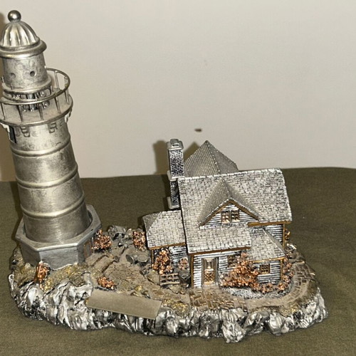 Vintage metal lighthouse decorative miniature with hidden compartment, like new
