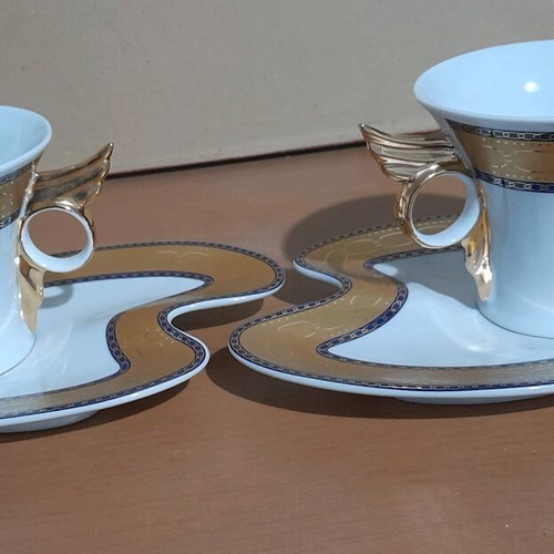 Limoge coffee cup set used, 2 cups with Hermes feather design