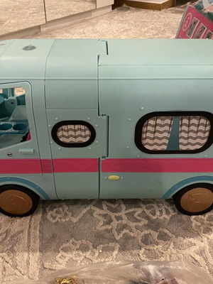 Bus and dolls like new, all together