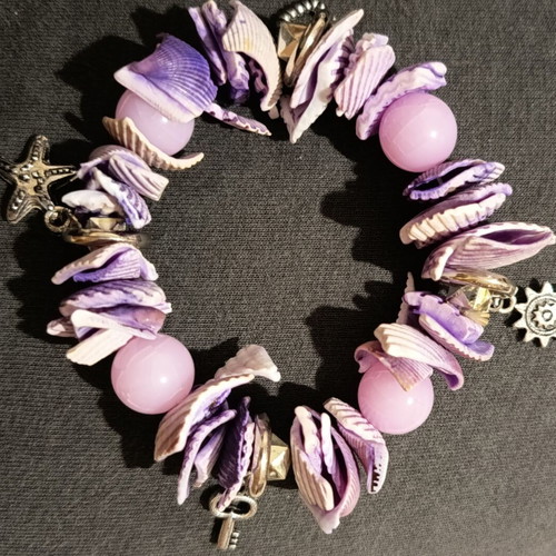Summer purple bracelet with shells like new