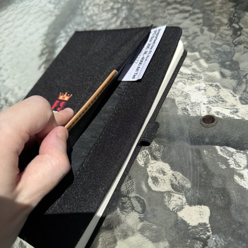 Black Agenda Notebook new with hardcover and elastic closure
