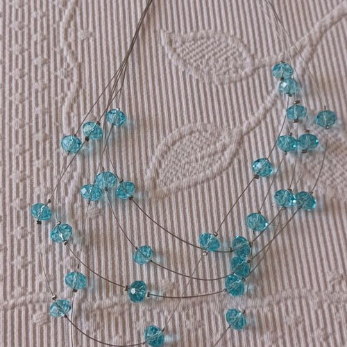 Blue necklace new with fishing line and blue stones