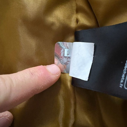 The North Face Millerton jacket like new, windproof, waterproof, black and gold
