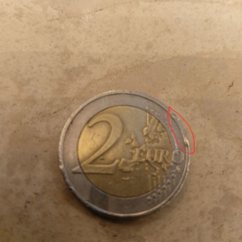 Greek 2€ commemorative coin 2009 used with minting errors