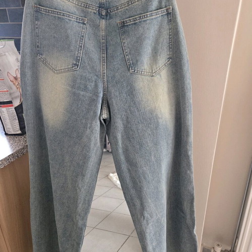 Jeans with knitted flowers and rips new, size M