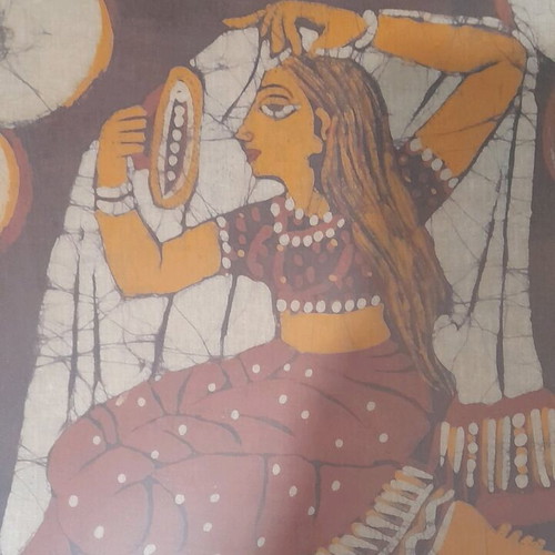 Indian batik used with girl combing hair, bathroom decoration