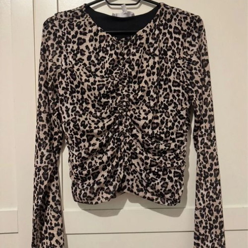 Animal print blouse Koton like new, slim fit with sheer sleeves