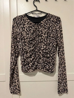 Animal print blouse Koton like new, slim fit with sheer sleeves