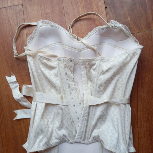 Bustier size Small like new, ivory with satin belt and lace