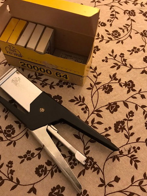 Stapler and 6 boxes of staples used
