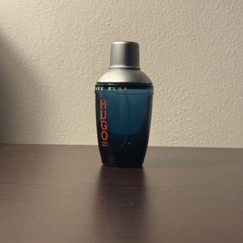Hugo Boss Dark Blue cologne bottle used, empty glass