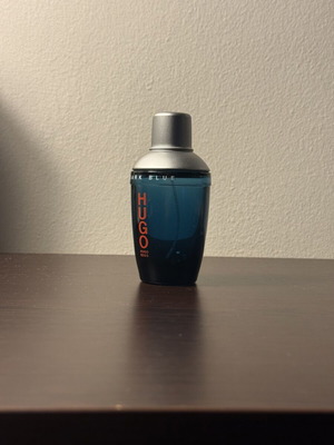 Hugo Boss Dark Blue cologne bottle used, empty glass