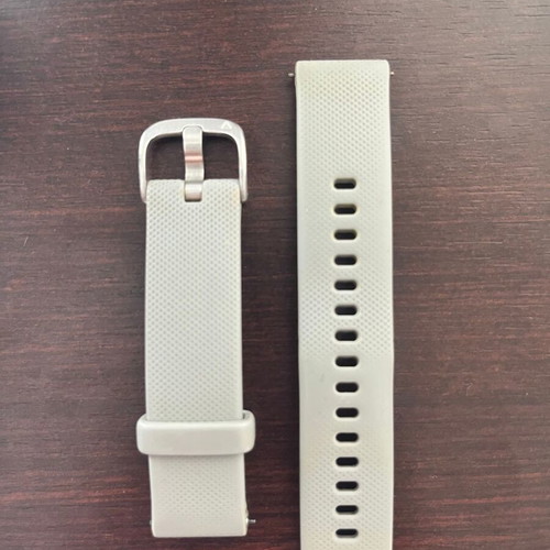 Garmin Vivoactive 4s smartwatch with charger and two straps