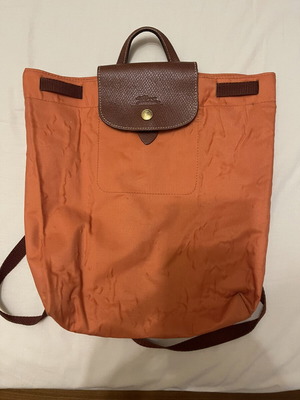 Longchamp Le Pliage backpack used, orange