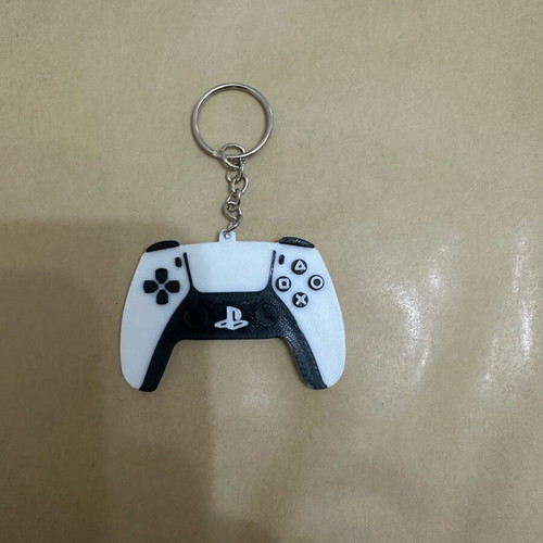 Dualsense PS5 keychain like new, black and white