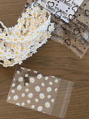 Κορδέλα και σακουλάκια μαργαρίτα καινούργια, 3 μέτρα και 20 τεμάχια