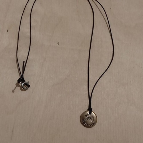 Small metal pendant with silver clasp refurbished