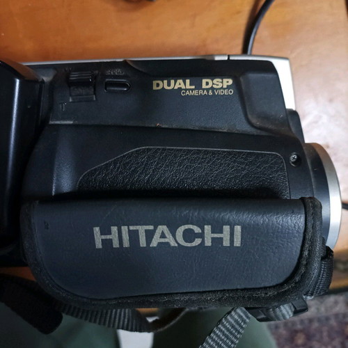 Hitachi video camera used with foldable screen and VHS cassette