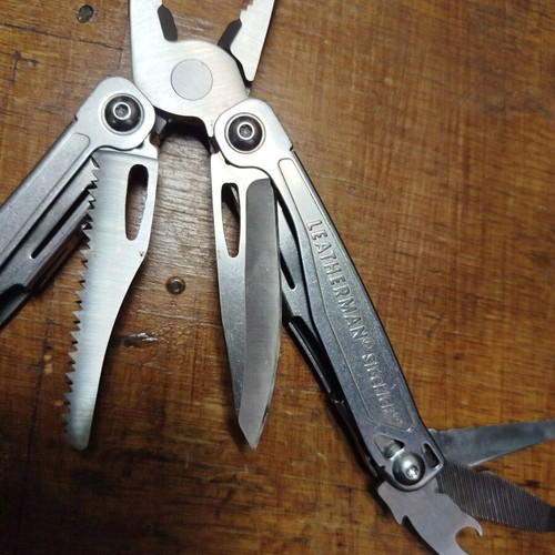 Leatherman Sidekick, Victorinox Swiss, and Opinel No6 knives like new