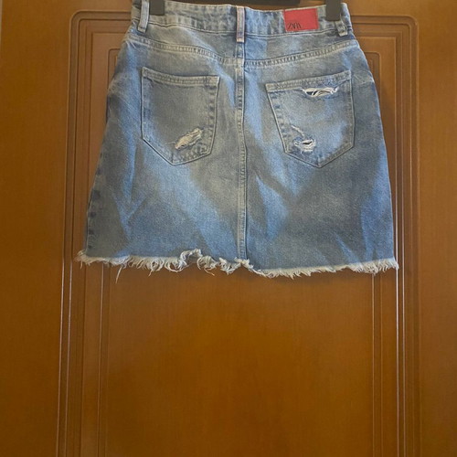 Zara denim skirt with rips used, front zipper