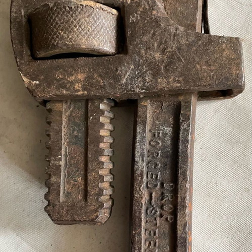 Heavy-Duty Pipe Wrench used, tool for tough cases