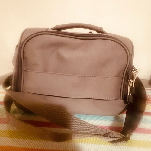 Delsey toiletry bag like new, gray with 2 compartments and shoulder strap