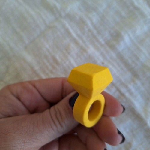 Yellow eraser in ring shape like new