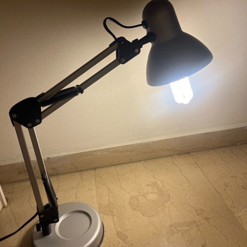 Adjustable desk lamp used