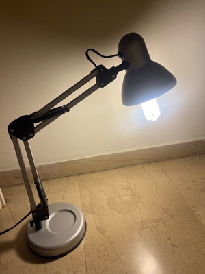 Adjustable desk lamp used
